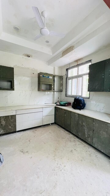 Kitchen in 4 BHK Builder Floor at Auram Floor, South City 2 – for Sale