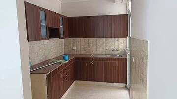 Kitchen in 2 BHK Apartment at Amrapali Golf Homes, Sector 4, Greater Noida – for Sale