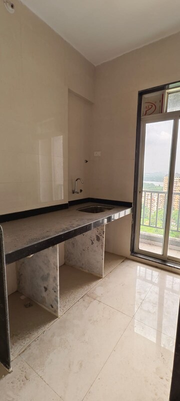 Kitchen in 1 BHK Apartment at Dombivli West – for Sale
