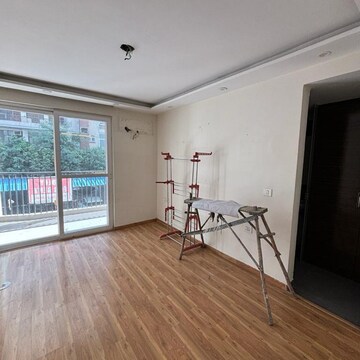 Room in 2 BHK Apartment at Paradigm Business Hermitage Park, Dhakoli Village – for Sale