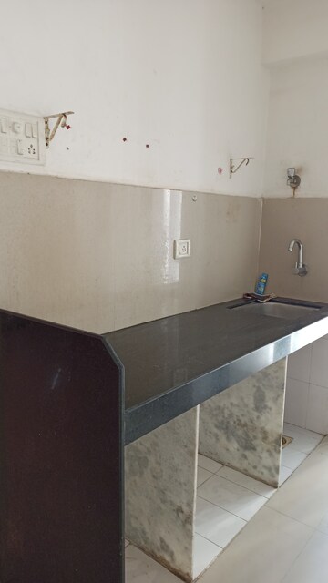 Kitchen in 1 BHK Apartment at Unicorn Global Arena, Naigaon East – for Sale