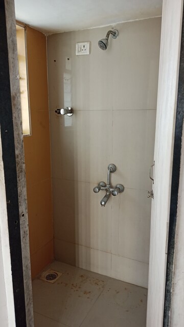 Bathroom in 1 BHK Apartment at Unicorn Global Arena, Naigaon East – for Sale