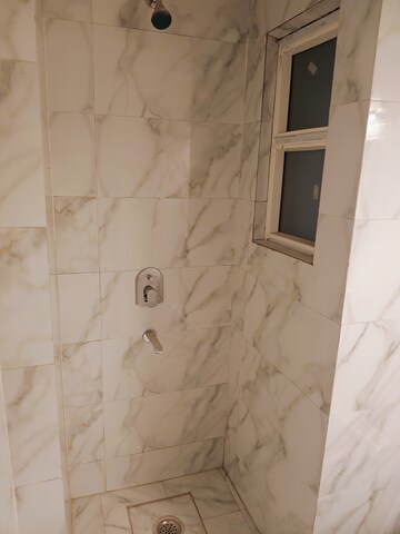 Bathroom in Studio Apartment at Earthcon Casa Grande II, Chi V Greater Noida – for Sale