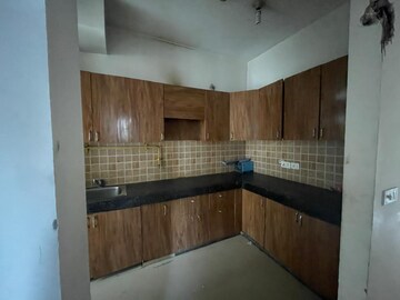 Kitchen in 2.5 BHK Apartment at Mahagun Mywoods, Sector 16c Greater Noida – for Sale
