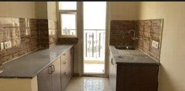 Kitchen in 3 BHK Apartment at Amrapali Golf Homes, Sector 4, Greater Noida – for Sale