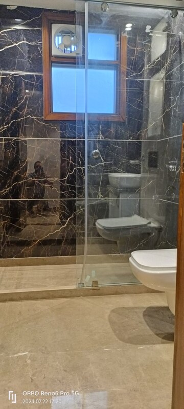 Bathroom in 4 BHK Builder Floor at Janakpuri – for Sale