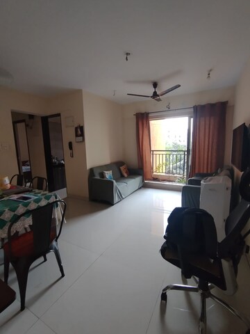 Living Room in 2 BHK Apartment at Garden Court, Waghbil – for Sale