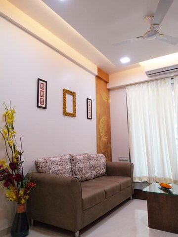 Living Room in 2 BHK Apartment at Gala Pride Palms, Kolshet Road – for Sale