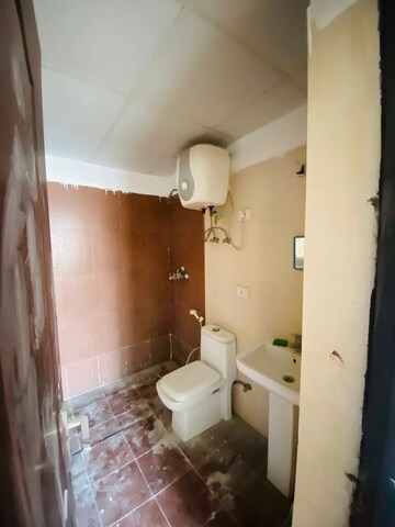 Bathroom in 2 BHK Apartment at Aims Golf Avenue II, Sector 75 – for Sale