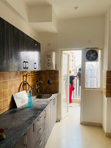 Kitchen in 2 BHK Apartment at Aims Golf Avenue II, Sector 75 – for Sale