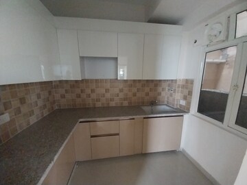 Kitchen in 2 BHK Apartment at Mahagun Mywoods, Sector 16c Greater Noida – for Sale