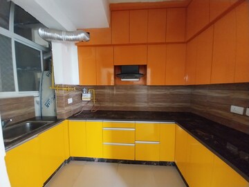 Kitchen in 2.5 BHK Apartment at Mahagun Mywoods, Sector 16c Greater Noida – for Sale