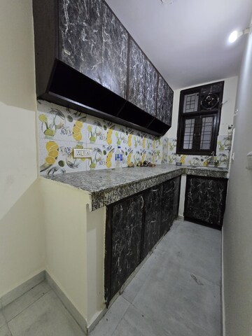Kitchen in 1 BHK Apartment at Chattarpur – for Sale