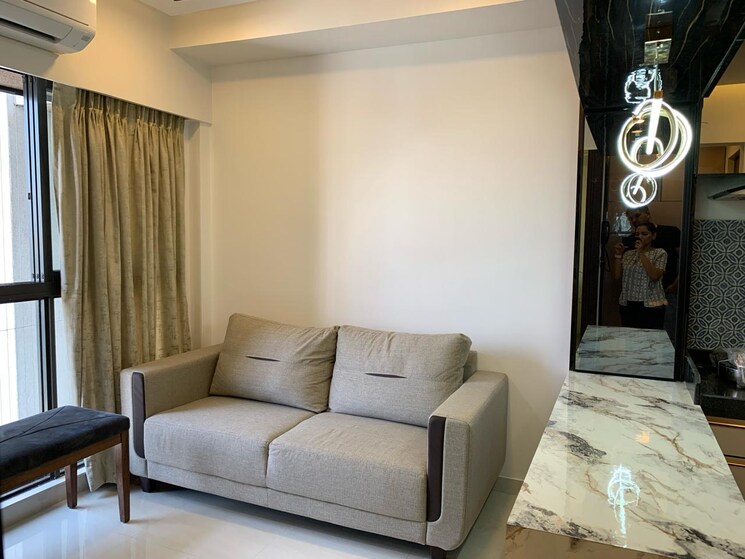 Living Room, lodha-quality-home-tower-5 1 Bedroom 338 Sq.Ft. Apartment In Majiwada Thane 7602904