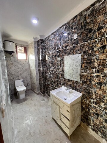 Bathroom in 3 BHK Builder Floor at Khirki Extension – for Sale