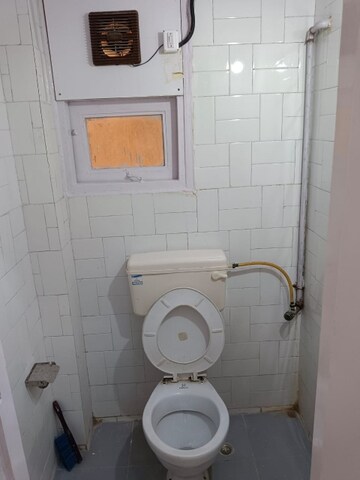 Bathroom in 1 BHK Apartment at Swiss Palace, Andheri West – for Sale
