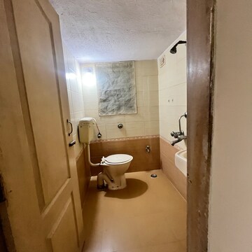 Bathroom in 2 BHK Apartment at Om Surya Darshan CHSL, Mira Road – for Sale
