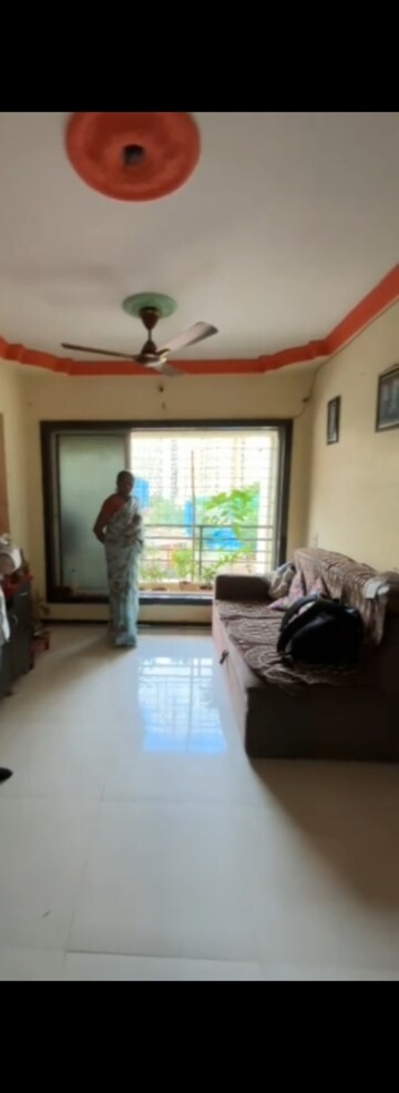 Living Room in 2 BHK Apartment at Vinay Nagar CHS, Mira Road – for Sale