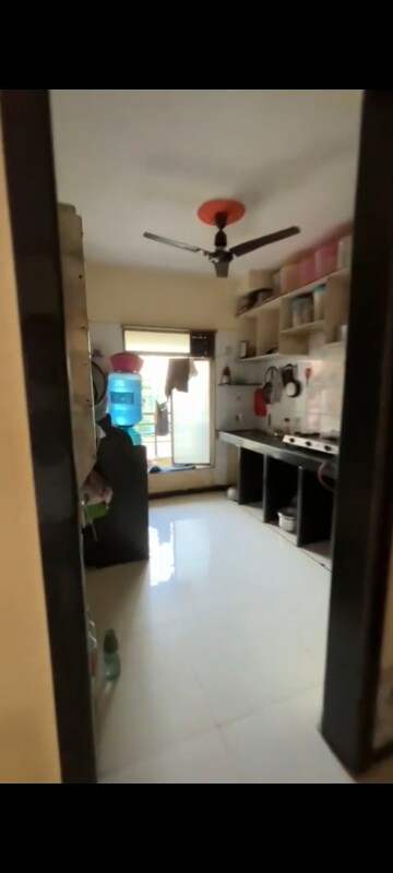 Kitchen in 2 BHK Apartment at Vinay Nagar CHS, Mira Road – for Sale