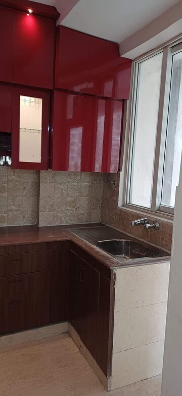 Kitchen in 3 BHK Apartment at Amrapali Golf Homes, Sector 4, Greater Noida – for Sale