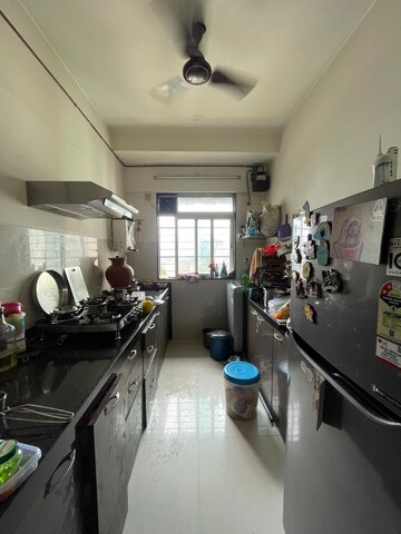 Kitchen in 1 BHK Apartment at Sheth Midori, Dahisar East – for Sale