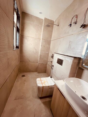 Bathroom in 4 BHK Builder Floor at Ansal API Esencia, Sector 67 – for Sale
