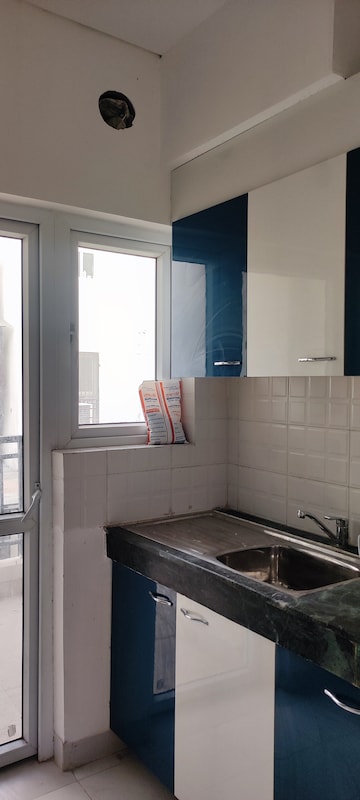 Kitchen in 3 BHK Builder Floor at BPTP Parkland, Sector 75 – for Sale