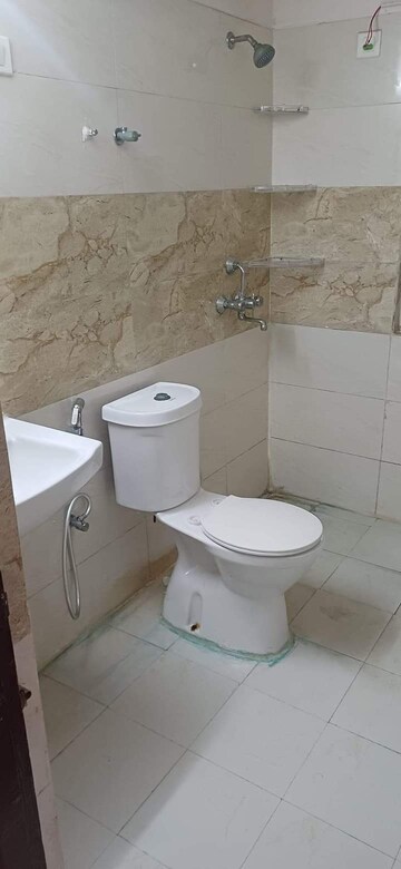 Bathroom in 2 BHK Apartment at Amrapali Golf Homes, Sector 4, Greater Noida – for Sale