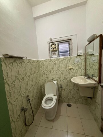 Bathroom in 2 BHK Apartment at Ganpat Apartment, Indiranagar – for Rent