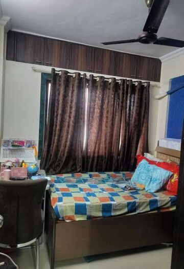 Bedroom in 2 BHK Apartment at Yashraj Park CHS, Kasarvadavali – for Sale