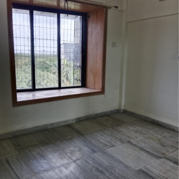 Bedroom in 1 BHK Apartment at Gagangiri Florence, Dahisar West – for Sale