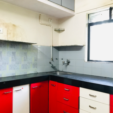 Kitchen in 2 BHK Apartment at Veda CHS, Dahisar West – for Sale