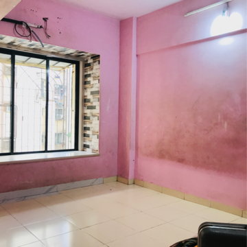 Bedroom in 2 BHK Apartment at Veda CHS, Dahisar West – for Sale