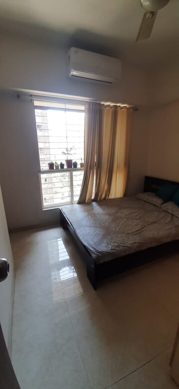 Living Room in 2 BHK Apartment at Lodha Amara, Kolshet Road – for Sale