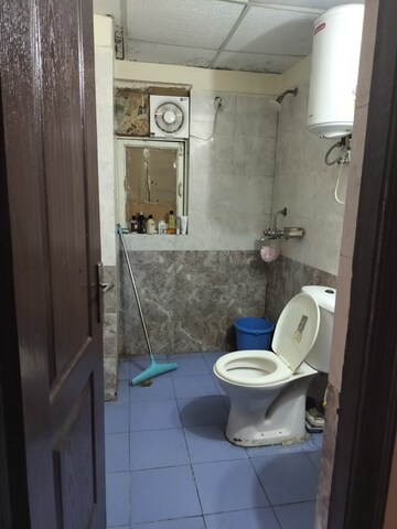 Bathroom in 3 BHK Apartment at Aims Golf City, Sector 75 – for Sale