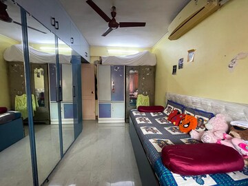 Bedroom in 1 BHK Apartment at Om Sai Aaradhana, Dahisar East – for Sale