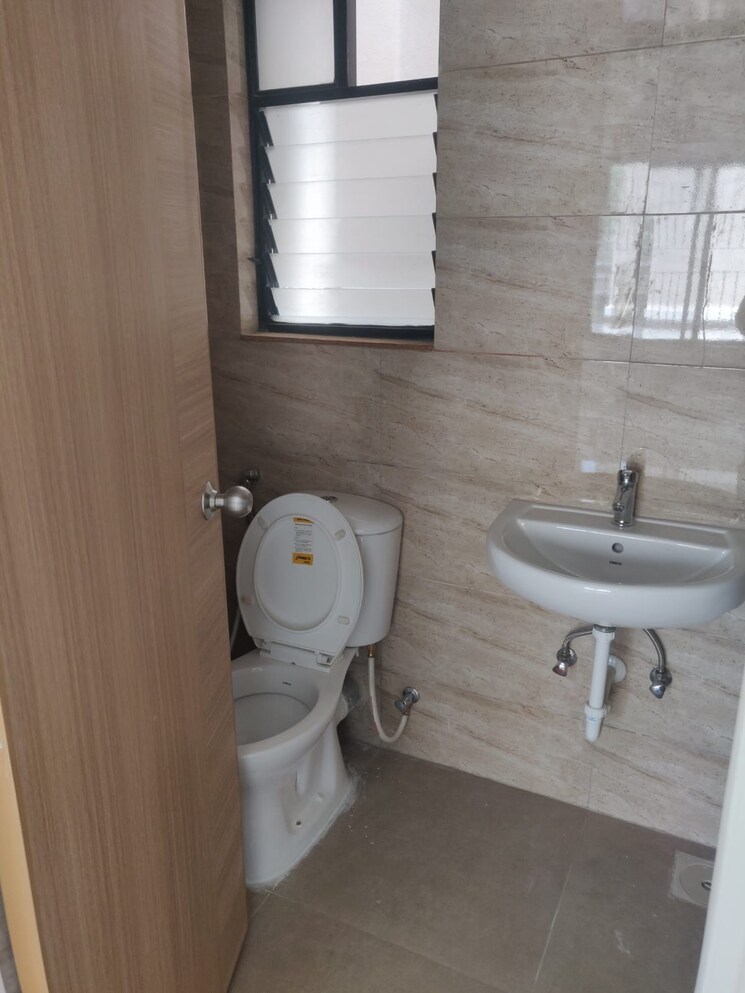 Bathroom, kumar-palaash-a 2 Bedroom 950 Sq.Ft. Apartment In Wadgaon Sheri Pune 7611419