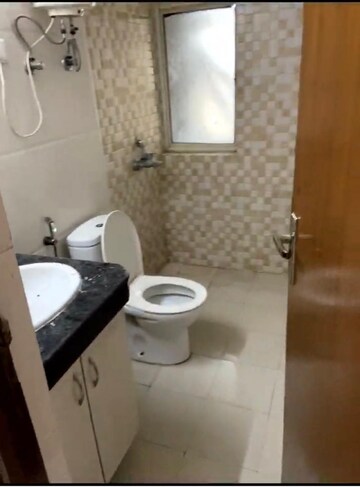 Bathroom in 2 BHK Apartment at Nimbus The Golden Palm, Sector 168 – for Rent