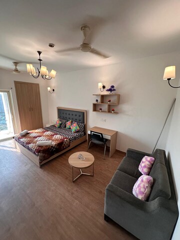 Living Room in 2 BHK Apartment at Nimbus The Golden Palm, Sector 168 – for Rent