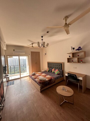 Living Room in 2 BHK Apartment at Nimbus The Golden Palm, Sector 168 – for Rent