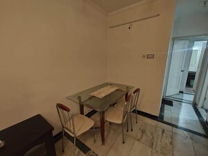 Living Room in 2 BHK Apartment at Palace Orchard CHS, Mohammadwadi – for Rent