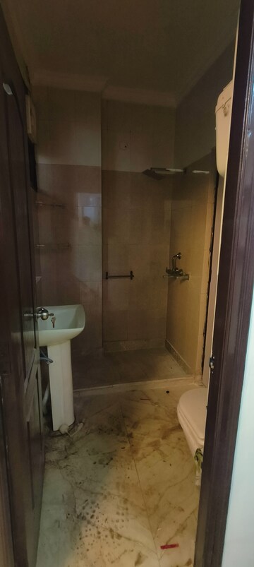Bathroom in 3 BHK Builder Floor at Rohini Sector 25 – for Sale