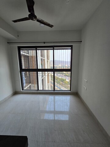 Room in 2 BHK Apartment at Acme Ozone, Manpada – for Sale