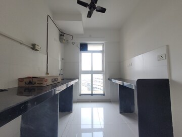Kitchen in 1.5 BHK Apartment at Godrej Emerald, Ghodbunder Road – for Sale