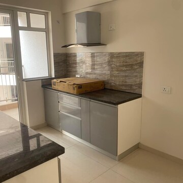 Kitchen in 3 BHK Apartment at Shapoorji Pallonji Joyville Phase 2, Sector 102 – for Sale