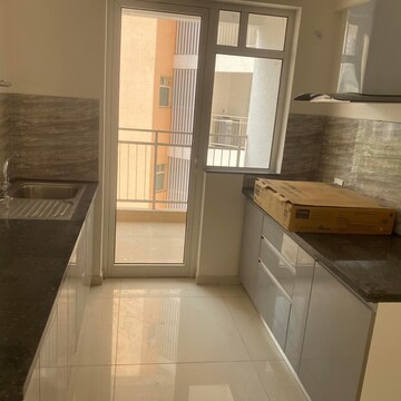 Kitchen in 3 BHK Apartment at Shapoorji Pallonji Joyville Phase 2, Sector 102 – for Sale