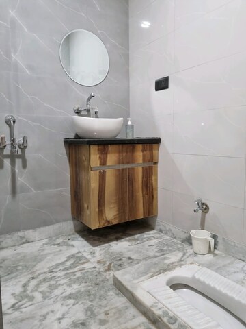Bathroom in 2 BHK Builder Floor at Dwarka Mor – for Rent