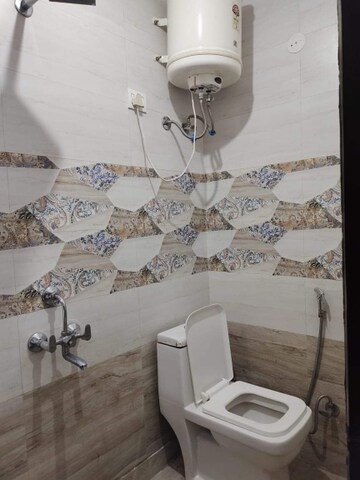 Bathroom in 2 BHK Builder Floor at Chattarpur – for Sale