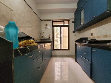 Kitchen in 1 BHK Apartment at Garden Grove, Borivali West – for Sale