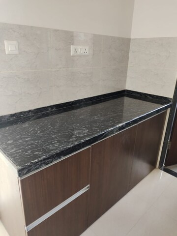 Kitchen in 3 BHK Apartment at Gera World of Joy, Kharadi – for Sale
